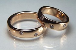 18kt wedding bands with 5 -.05ct diamonds